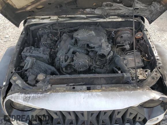 2014 Jeep Wrangler Unlimited Sahara z VIN 1C4BJWEG9EL102336, wystawiony jako Copart lot #55391335 z przebiegiem Nie podano mil oraz Szkoda całkowita • Salvage title. Historia ofert i sprzedaży dostępna na DreamBid. Obrazek 12.