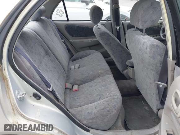 1999 Toyota Corolla VE z VIN 2T1BR12E7XC154444, wystawiony jako IAAI lot #42514069 z przebiegiem 209 377 mil mil oraz . Historia ofert i sprzedaży dostępna na DreamBid. Obrazek 8.