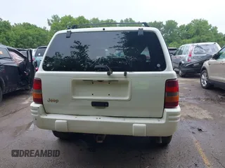 1997 Jeep Grand Cherokee Limited z VIN 1J4GZ78S1VC536295, wystawiony jako IAAI lot #42435292 z przebiegiem 310 005 mil mil oraz . Historia ofert i sprzedaży dostępna na DreamBid. Obrazek 17.