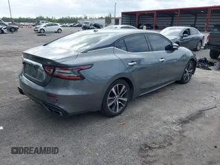 2020 Nissan Maxima SV with VIN 1N4AA6CV1LC377182, listed as a IAAI auction lot 41912923 with 122,728 mi miles and . Bid and sale history available at DreamBid. Image 4.