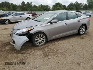 2014 Hyundai Azera Limited z VIN KMHFH4JG3EA374587, wystawiony jako Copart lot #56535405 z przebiegiem 99 093 mil mil oraz Szkoda całkowita • Salvage title. Historia ofert i sprzedaży dostępna na DreamBid. Obrazek 1.