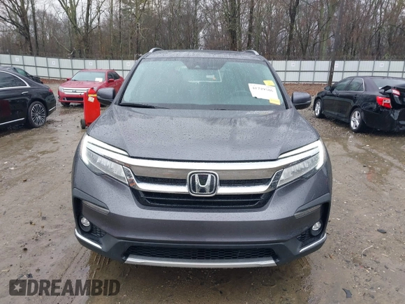 2021 Honda Pilot Touring 8-Passenger with VIN 5FNYF5H9XMB014190, listed as a IAAI auction lot 41749586 with 67,602 mi miles and . Bid and sale history available at DreamBid. Image 13.