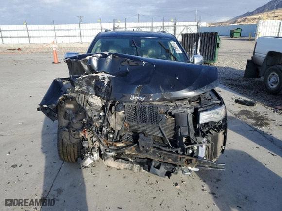 2014 Jeep Grand Cherokee Overland with VIN 1C4RJFCM5EC417335, listed as a Copart auction lot 87300714 with 0 mi miles and Salvage Title. Bid and sale history available at carsss.com. Image 5.