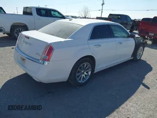 2014 Chrysler 300 with VIN 2C3CCAEG4EH312930, listed as a IAAI auction lot 41907509 with 128,940 mi miles. Bid and sale history available at carsss.com. Image 4.