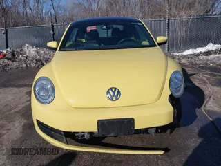 2012 Volkswagen Beetle 2.5L PZEV with VIN 3VWJP7AT9CM610530, listed as a IAAI auction lot 41388728 with 143,909 mi miles. Bid and sale history available at carsss.com. Image 12.