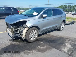 2021 Ford Edge Titanium with VIN 2FMPK3K97MBA15391, listed as a IAAI auction lot 42711656 with 40,723 mi miles and . Bid and sale history available at DreamBid. Image 19.