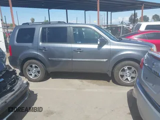 2011 Honda Pilot Touring with VIN 5FNYF4H96BB083532, listed as a IAAI auction lot 41926177 with 100,815 mi miles. Bid and sale history available at carsss.com. Image 14.