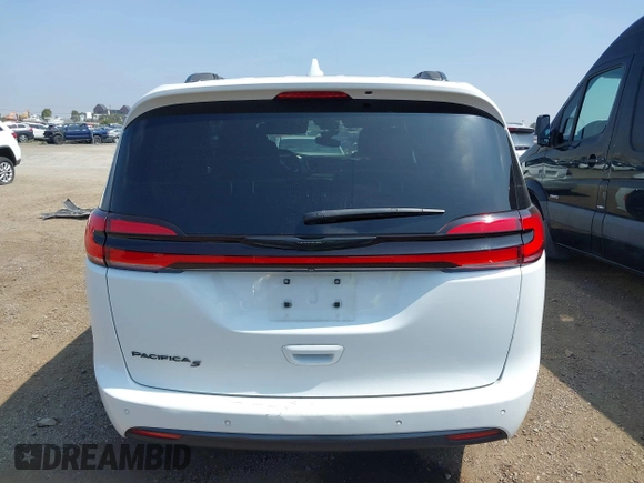 2021 Chrysler Pacifica Touring with VIN 2C4RC1FG7MR605587, listed as a IAAI auction lot 42329028 with 111,305 mi miles and . Bid and sale history available at DreamBid. Image 16.