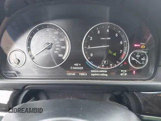 2015 BMW 5 Series 528i with VIN WBA5A5C5XFD524150, listed as a IAAI auction lot 42115568 with 133,145 mi miles and . Bid and sale history available at DreamBid. Image 7.