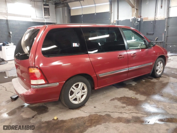 2002 Ford Windstar Wagon SE with VIN 2FMZA52442BB60882, listed as a IAAI auction lot 41621529 with 136,753 mi miles. Bid and sale history available at carsss.com. Image 4.