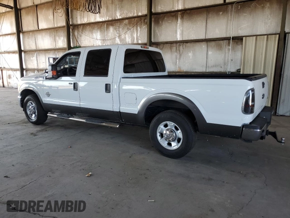 2011 Ford F-250 XL with VIN 1FT7W2AT2BEC57538, listed as a Copart auction lot 64505735 with 153,584 mi miles and Salvage title. Bid and sale history available at DreamBid. Image 2.