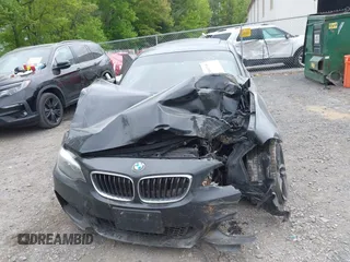 2016 BMW 2 Series 228i xDrive z VIN WBA1G9C52GV598422, wystawiony jako IAAI lot #42309718 z przebiegiem 142 682 mil mil oraz . Historia ofert i sprzedaży dostępna na DreamBid. Obrazek 11.