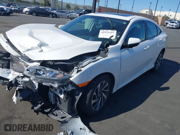 2018 Honda Civic EX with VIN 2HGFC2F71JH502564, listed as a IAAI auction lot 41933157 with 56,696 mi miles and . Bid and sale history available at DreamBid. Image 18.