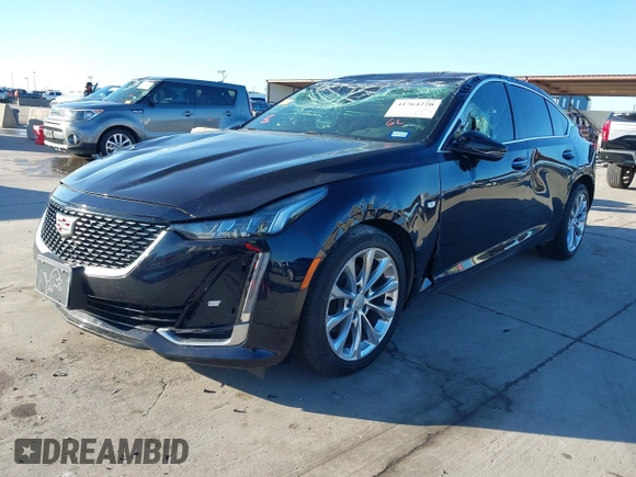 2021 Cadillac CT5 Premium Luxury z VIN 1G6DT5RW8M0100093, wystawiony jako IAAI lot #41764220 z przebiegiem 36 469 mil mil oraz . Historia ofert i sprzedaży dostępna na DreamBid. Obrazek 2.
