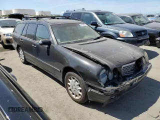 2001 Mercedes-Benz E-Class AWD with VIN WDBJH82J71X051634, listed as a Copart auction lot 51299544 with 286,211 mi miles and Salvage Title. Bid and sale history available at carsss.com. Image 4.