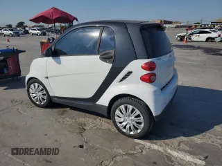 2012 Smart fortwo Pure z VIN WMEEJ3BA5CK540092, wystawiony jako Copart lot #75701964 z przebiegiem 59 355 mil mil oraz Szkody całkowita. Historia ofert i sprzedaży dostępna na DreamBid. Obrazek 2.