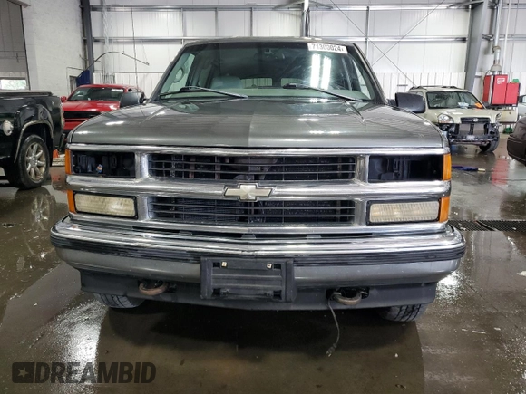 1999 Chevrolet Suburban with VIN 3GNFK16R8XG149091, listed as a Copart auction lot 71300024 with 254,044 mi miles and Salvage Title. Bid and sale history available at carsss.com. Image 5.