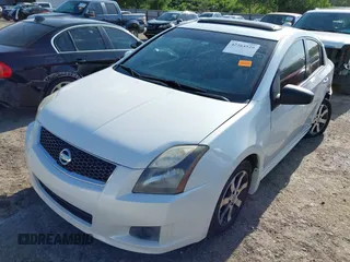 2012 Nissan Sentra SR with VIN 3N1AB6AP8CL765965, listed as a IAAI auction lot 42564529 with 128,511 mi miles and . Bid and sale history available at DreamBid. Image 2.
