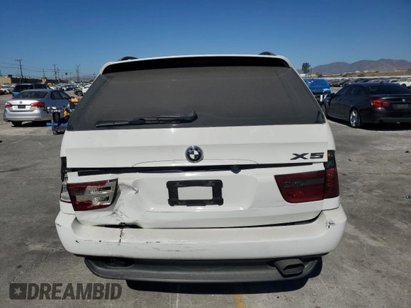 2006 BMW X5 3.0i with VIN 5UXFA135X6LY28695, listed as a Copart auction lot 77018914 with 209,013 mi miles and Salvage Title. Bid and sale history available at carsss.com. Image 6.