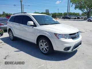 2014 Dodge Journey SXT with VIN 3C4PDCBG4ET235848, listed as a IAAI auction lot 41824155 with 48,691 mi miles and . Bid and sale history available at DreamBid. Image 1.