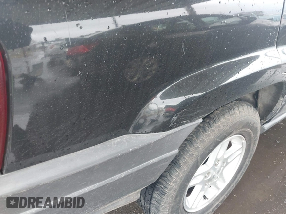 2004 Jeep Grand Cherokee Laredo z VIN 1J4GX48N94C435700, wystawiony jako IAAI lot #41809624 z przebiegiem 147 413 mil mil oraz . Historia ofert i sprzedaży dostępna na DreamBid. Obrazek 6.