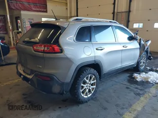 2015 Jeep Cherokee Latitude with VIN 1C4PJMCS5FW510298, listed as a IAAI auction lot 41518453 with 99,568 mi miles and . Bid and sale history available at DreamBid. Image 4.