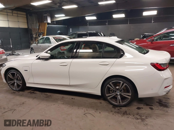 2023 BMW 3 Series 330e xDrive with VIN 3MW39FS05P8D20575, listed as a IAAI auction lot 42076033 with 10,875 mi miles. Bid and sale history available at carsss.com. Image 14.