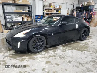 2016 Nissan 370Z with VIN JN1AZ4EH5GM934001, listed as a Copart auction lot 41596415 with 96,930 mi miles and Salvage Title. Bid and sale history available at carsss.com. Image 1.