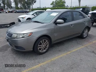 2012 Kia Forte EX with VIN KNAFU4A2XC5560585, listed as a IAAI auction lot 42121133 with 151,079 mi miles. Bid and sale history available at carsss.com. Image 17.