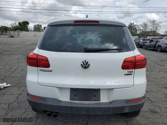 2017 Volkswagen Tiguan Wolfsburg Edition with VIN WVGSV7AX0HK014796, listed as a Copart auction lot 51113015 with 51,592 mi miles and Salvage Title. Bid and sale history available at carsss.com. Image 6.