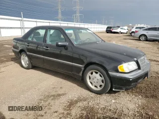 1999 Mercedes-Benz C 230/260/280/320 with VIN WDBHA24G9XA716840, listed as a Copart auction lot 49605205 with 56,535 mi miles and Clean title. Bid and sale history available at DreamBid. Image 4.