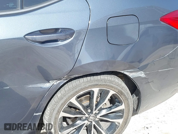 2019 Toyota Corolla L with VIN 5YFBURHE9KP910059, listed as a IAAI auction lot 41856905 with 104,096 mi miles and . Bid and sale history available at DreamBid. Image 6.