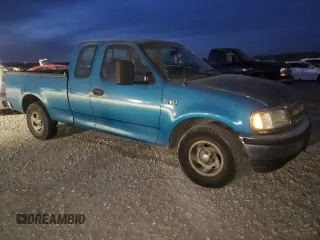 1997 Ford F-150 with VIN 1FTDX1729VND13052, listed as a Copart auction lot 83251714 with 134,450 mi miles and Salvage title. Bid and sale history available at DreamBid. Image 4.