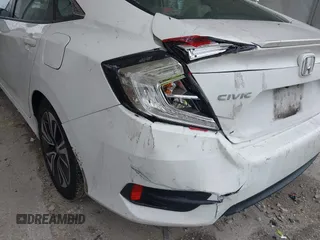 2017 Honda Civic EX-L z VIN 19XFC1F78HE025582, wystawiony jako IAAI lot #42432134 z przebiegiem 144 688 mil mil oraz . Historia ofert i sprzedaży dostępna na DreamBid. Obrazek 6.