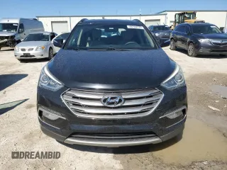 2017 Hyundai Santa Fe 2.4L z VIN 5NMZUDLB4HH032235, wystawiony jako Copart lot #49769775 z przebiegiem 102 655 mil mil oraz Szkoda całkowita • Salvage title. Historia ofert i sprzedaży dostępna na DreamBid. Obrazek 5.