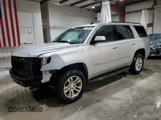 2015 Chevrolet Tahoe LT with VIN 1GNSKBKC1FR234889, listed as a Copart auction lot 60786475 with 255,271 mi miles and Salvage title. Bid and sale history available at DreamBid. Image 1.