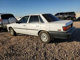 1989 Toyota Camry z VIN 4T1SV24E5KU019985, wystawiony jako Copart lot #81200104 z przebiegiem 207 103 mil mil oraz Szkoda całkowita • Salvage title. Historia ofert i sprzedaży dostępna na DreamBid. Obrazek 2.