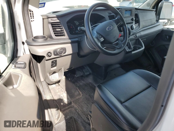 2023 Ford Transit Cargo with VIN 1FTBR1Y88PKA97221, listed as a Copart auction lot 43410475 with 34,927 mi miles and Salvage Title. Bid and sale history available at DreamBid. Image 8.