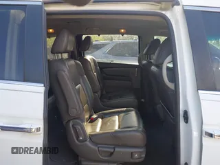 2012 Honda Odyssey EX-L with VIN 5FNRL5H62CB010054, listed as a IAAI auction lot 42040117 with 189,566 mi miles and . Bid and sale history available at carsss.com. Image 8.
