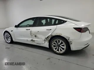 2023 Tesla Model 3 with VIN 5YJ3E1EA7PF428472, listed as a Copart auction lot 56520465 with 79,936 mi miles and Clean title. Bid and sale history available at DreamBid. Image 2.
