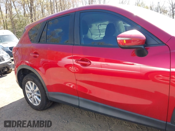 2016 Mazda CX-5 Sport with VIN JM3KE4BY7G0805631, listed as a IAAI auction lot 42028606 with 93,659 mi miles and . Bid and sale history available at carsss.com. Image 13.