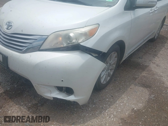 2014 Toyota Sienna XLE with VIN 5TDYK3DC2ES517663, listed as a IAAI auction lot 42171862 with 143,447 mi miles and . Bid and sale history available at DreamBid. Image 17.