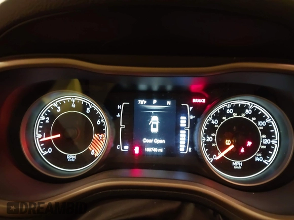 2015 Jeep Cherokee Latitude with VIN 1C4PJLCS8FW689849, listed as a IAAI auction lot 42144161 with 138,740 mi miles and . Bid and sale history available at carsss.com. Image 7.