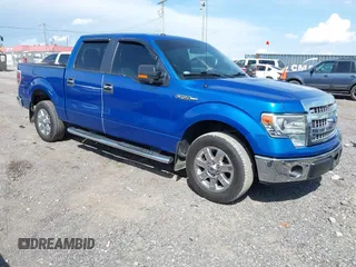 2014 Ford F-150 XL with VIN 1FTFW1CF4EKF14279, listed as a IAAI auction lot 42006454 with 104,648 mi miles. Bid and sale history available at carsss.com. Image 1.