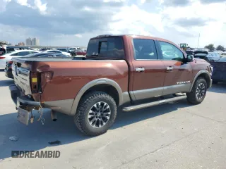 2018 Nissan Titan Pro-4X z VIN 1N6AA1E50JN526481, wystawiony jako Copart lot #71800504 z przebiegiem 147 463 mil mil oraz Szkoda całkowita • Salvage title. Historia ofert i sprzedaży dostępna na DreamBid. Obrazek 3.