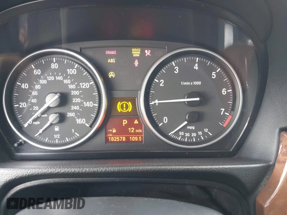 2008 BMW 3 Series 328i with VIN WBAVA37518NL19764, listed as a IAAI auction lot 41549896 with 182,578 mi miles. Bid and sale history available at carsss.com. Image 7.