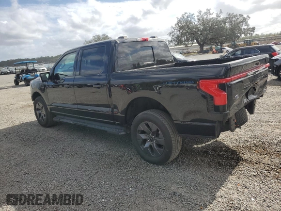 2022 Ford F-150 Lightning Pro z VIN 1FT6W1EV4NWG14041, wystawiony jako Copart lot #85252844 z przebiegiem 31 093 mil mil oraz Szkoda całkowita • Salvage title. Historia ofert i sprzedaży dostępna na DreamBid. Obrazek 2.