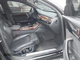 2014 Audi A8 3.0T z VIN WAURGAFD5EN004118, wystawiony jako IAAI lot #41919506 z przebiegiem 182 382 mil mil oraz . Historia ofert i sprzedaży dostępna na DreamBid. Obrazek 5.