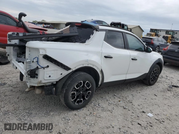 2022 Hyundai Santa Cruz SEL z VIN 5NTJCDAE5NH039059, wystawiony jako Copart lot #53894105 z przebiegiem 33 463 mil mil oraz Szkoda całkowita • Salvage title. Historia ofert i sprzedaży dostępna na DreamBid. Obrazek 3.