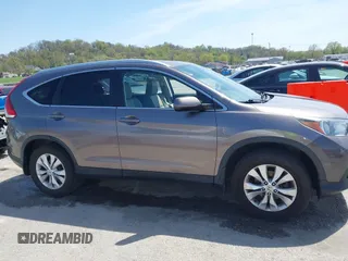 2014 Honda CR-V EX-L with VIN 5J6RM4H70EL096555, listed as a IAAI auction lot 42038062 with 113,601 mi miles. Bid and sale history available at carsss.com. Image 13.